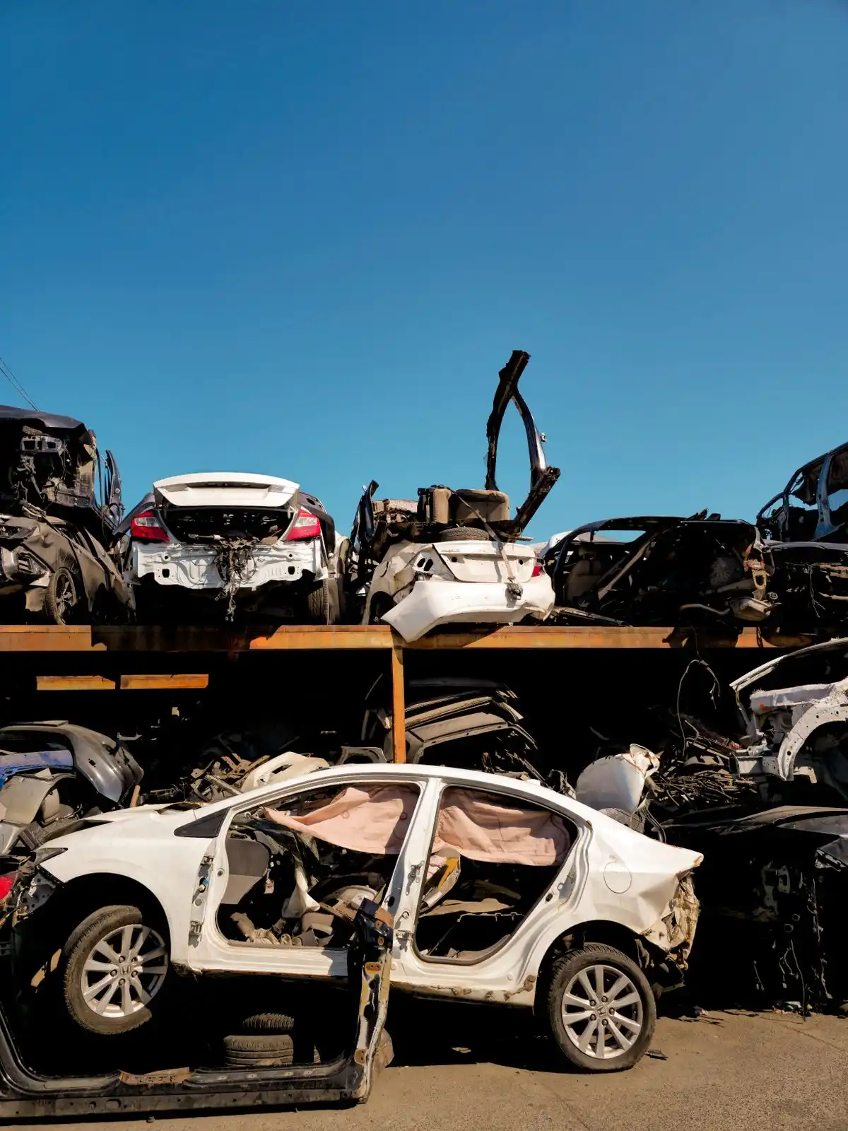 A scrapped, non-running car ready for eco-friendly recycling
