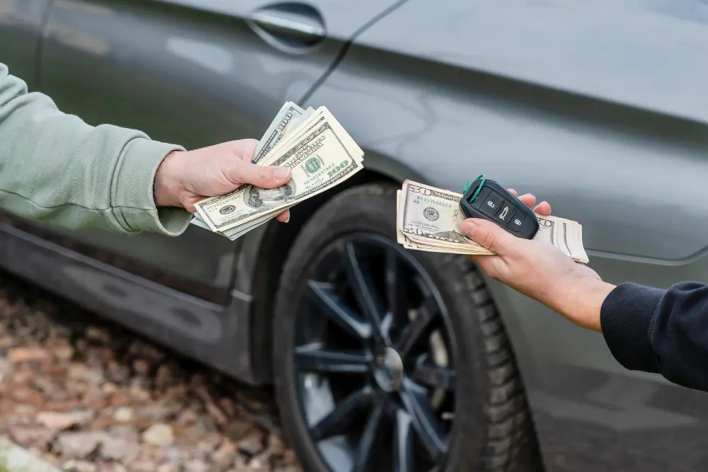 Cash payment handed over for a used car sale in Bendigo